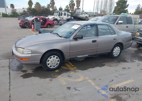 1994 Toyota Camry Le z USA, uszkodzony, nr VIN JT2SK12E7R0199233